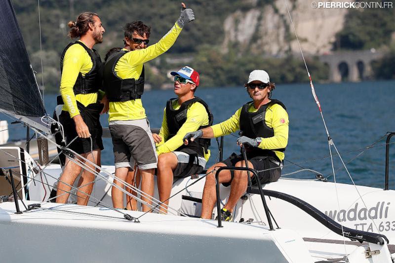 Caipirinha Junior (ITA633, 8-1) with Matteo Ivaldi at the helm and Gabriele Benussi calling tactics, wins the second race today - Melges 24 European Championship 2018 photo copyright Pierrick Contin taken at Fraglia Vela Riva and featuring the Melges 24 class
