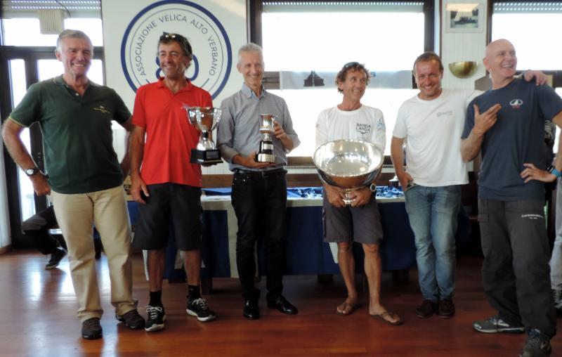 Flavio Favini helming Gianluca Perego's MAIDOLLIS ITA854 with his fellow sailors from BLUE MOON Tiziano Nava,Giovanni Ferrari and Federico Valenti,and in addition also Alfio Lavazza,is the winner of XV Lino Favini Cup as well the Melges 24 Swiss champion photo copyright Piret Salmistu taken at  and featuring the Melges 24 class