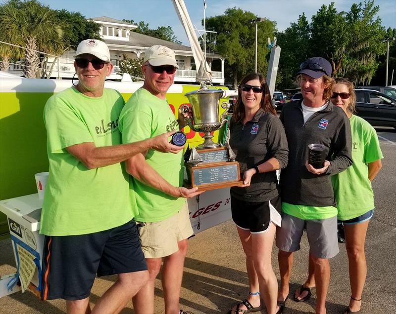 FNG/Eelsnot Racing Team showing off their hard-earned Melges 24 silverware photo copyright Zane Yoder taken at Fairhope Yacht Club and featuring the Melges 24 class