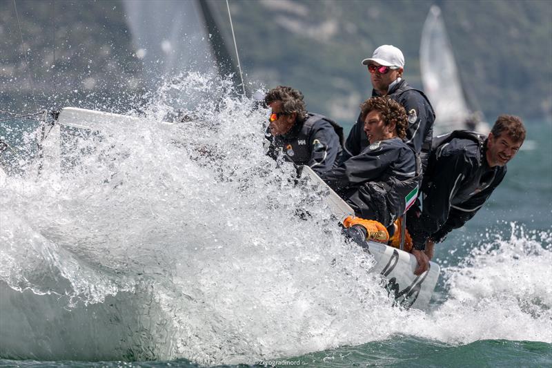 After day 1 of the Melges 24 European Sailing Series at Garda, the second place of the provisional Top Three is for Bombarda by Andrea Pozzi photo copyright Zerogradinord / IM24CA taken at Fraglia Vela Riva and featuring the Melges 24 class