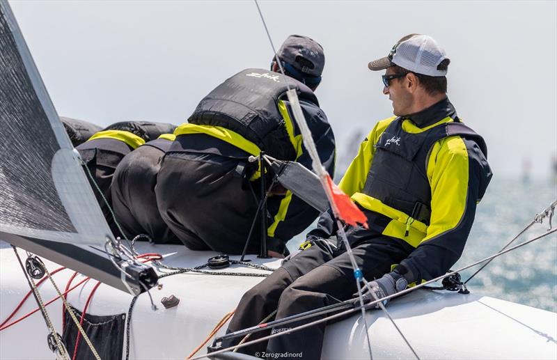 Gian Luca Perego's Maidollis ITA854 with Carlo Fracassoli at the helm holds tight to the top of the standings with 8 points. - Day 2 - Melges 24 European Sailing Series at Riva del Garda, Italy photo copyright Mauro Melandri / Zerogradinord taken at Fraglia Vela Riva and featuring the Melges 24 class