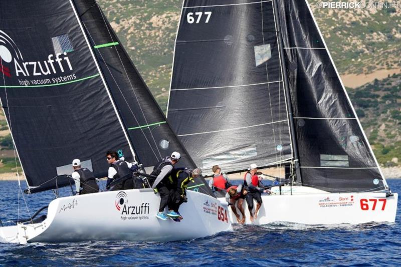 Gianluca Perego's Maidollis ITA854 (6-14 today) leads the pack tied on points with Bombarda ITA860 photo copyright Pierrick Contin / IM24CA taken at Lega Navale Italiana and featuring the Melges 24 class