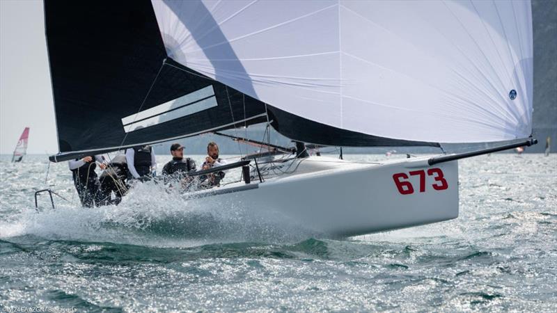Peter Karrie's Nefeli GER673 leading the pack - Melges 24 European Sailing Series 2021 - Event 2 - Riva del Garda, Italy  photo copyright IM24CA / ZGN/ Barracuda Communication taken at Fraglia Vela Riva and featuring the Melges 24 class