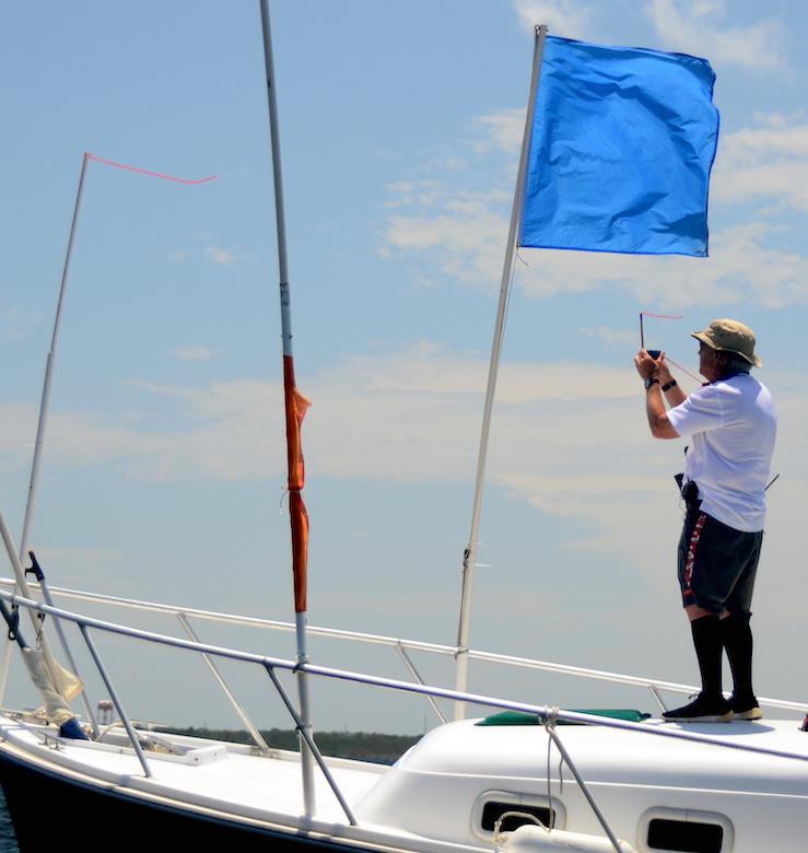 Pensacola YC's PRO Hal Smith, aka Wind Wizard, read the no-wind forecast for Sunday at the 2019 Busahwhacker Cup and got in five races on Saturday photo copyright Talbot Wilson taken at Pensacola Yacht Club and featuring the Melges 24 class