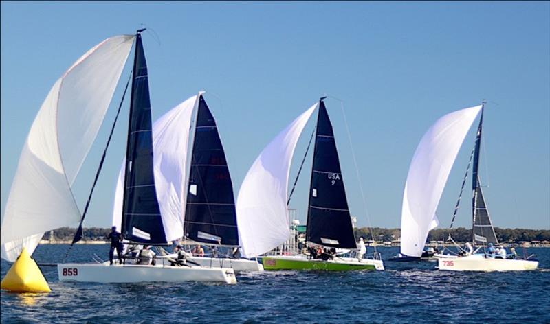 A close finish in Race 5 of the Pensacola YC 2021 Melges 24 Bushwhacker Cup for the Atlantic Coast and Gulf Coast Championships. Of the group USA360 'Revolution', was 6, 859 'Nefeli' was 7, 009 'Friday Night Gigalos' was 8 and 735 'Triple D's' was 9. - photo © Talbot Wilson