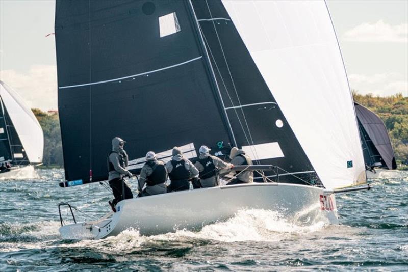 Fred Rozelle and his family based Melges 24 team love sailing the Quantum Great Lakes Cup Series! photo copyright Morgan Kinney / Melges Performance Sailboats taken at  and featuring the Melges 24 class