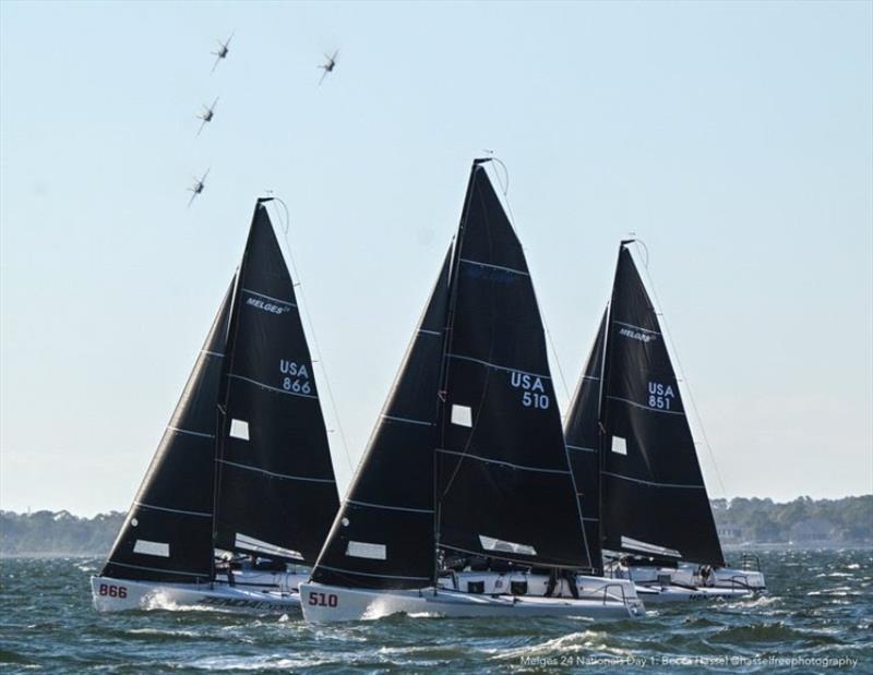 The Melges 24 fleet powers upwind in breezy, picture-perfect Pensacola conditions, while the U.S. Navy Blue Angels soar overhead—a signature spectacle at their home base that makes every Nationals here unforgettable - photo © Becca Hassell / Oakcliff Sailing