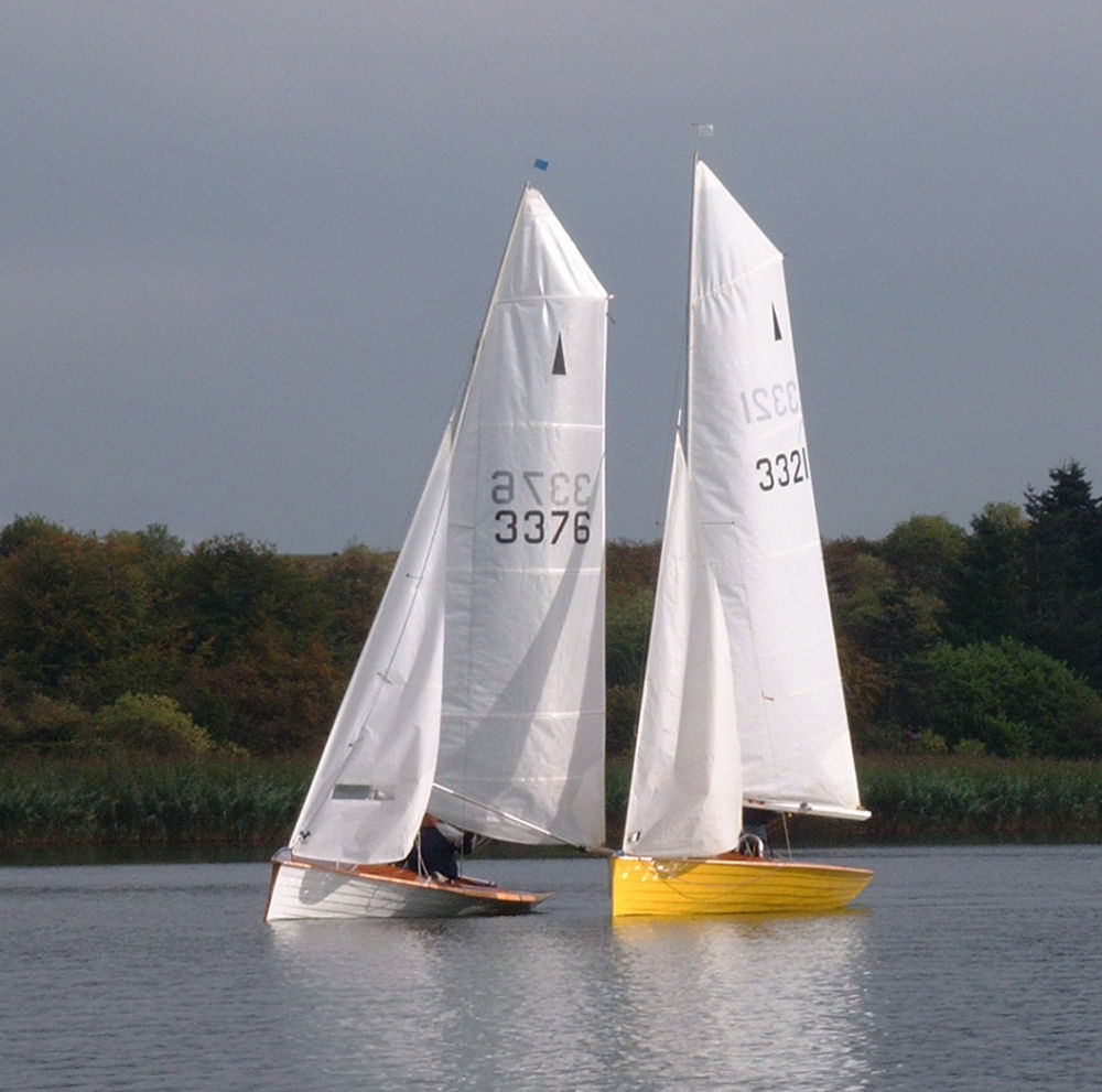 5 Merlins race on Forfar Loch photo copyright Hamish Myles taken at Forfar Sailing Club and featuring the Merlin Rocket class