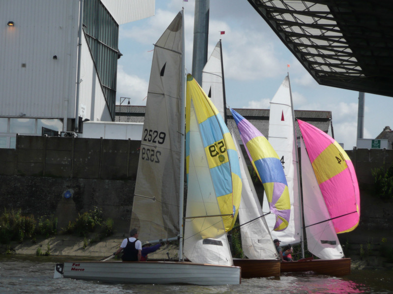 Vintage Merlin sailing past Craven Cottage during the DeMay Series in 2008 photo copyright Ranelagh SC taken at Ranelagh Sailing Club and featuring the Merlin Rocket class