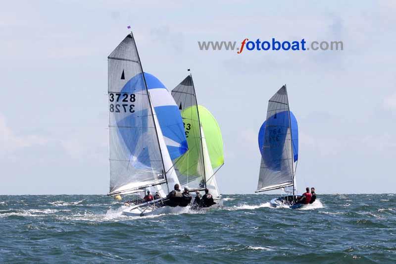 Racing at Carnac 2014 photo copyright John Murrell / www.fotoboat.com taken at Yacht Club de Carnac and featuring the Merlin Rocket class