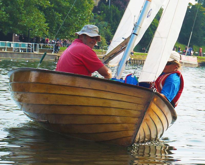 The varnished clinker hull of Dennis Lockwood's Merlin, crewed by Erica Bishop, shows why people love the old river Merlins photo copyright John Forbes taken at Minima Yacht Club and featuring the Merlin Rocket class