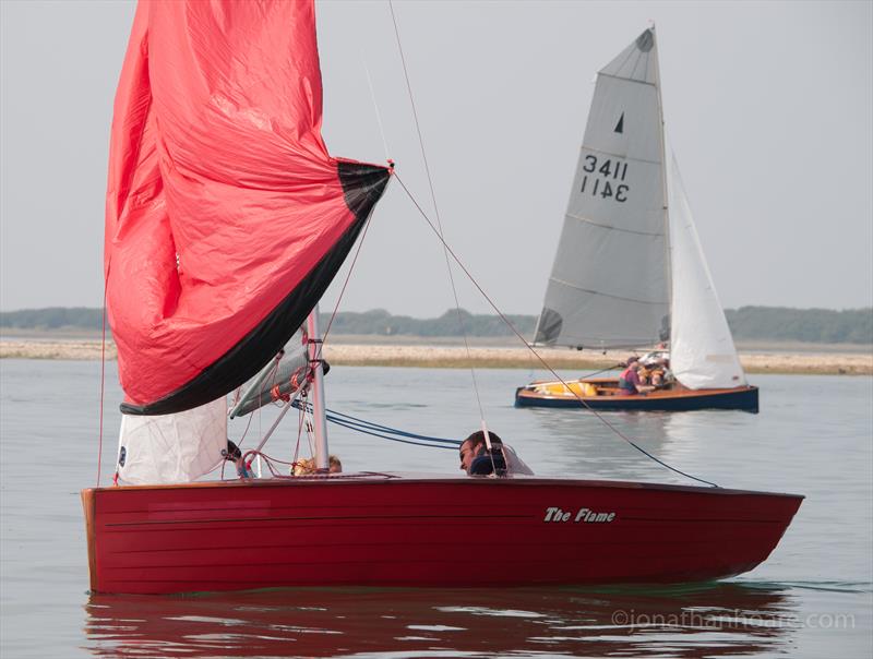 Fast fleet winner ‘The Flame’ sailed by Tim & Rebecca Male from Blithfield at the Bosham Classic Boat Revival 2014 photo copyright Jonathan Hoare / www.jonathanhoare.com taken at Bosham Sailing Club and featuring the Merlin Rocket class