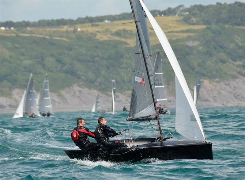 Dave Hayes of Selden Masts leading a race at the Merlin Nationals in Looe photo copyright www.fotoboat.com taken at Looe Sailing Club and featuring the Merlin Rocket class