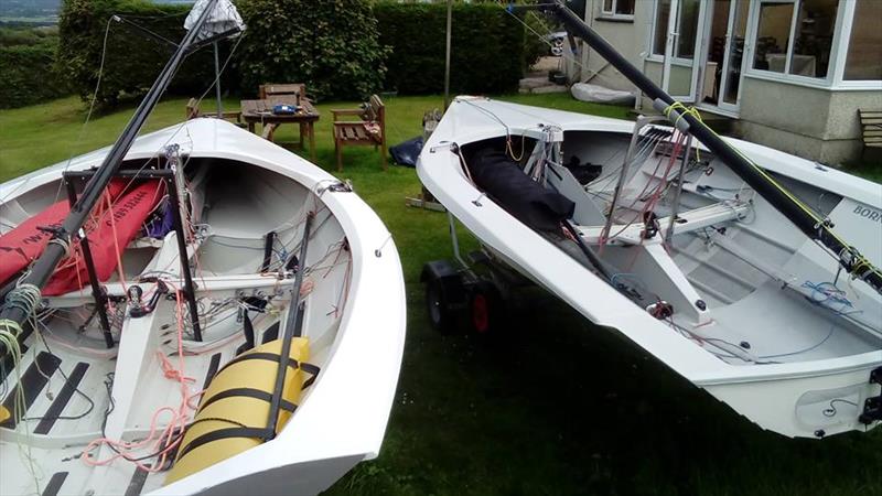 Two hulls that are identical from keel band to sheerline, but one is ply, the other FRP, yet just by looking, it is hard to see which is which. The difference quickly becomes apparent out on the race course though photo copyright Miles James taken at  and featuring the Merlin Rocket class