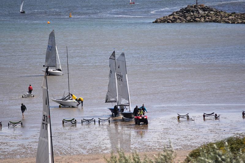 Plas Heli worked hard at the big little things. When coming ashore at low tide, there were quad bikes to help pull the boats up the beach! photo copyright David Henshall taken at Pwllheli Sailing Club and featuring the Merlin Rocket class