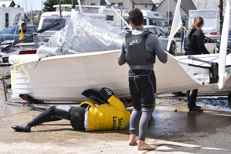 Champions Nick Craig and Andy Roberts are where they are because of their attention to detail. Even after a hard sail, the slot gasket gets checked (and gives us a nice view of the Turner Genii hull shape - photo © David Henshall