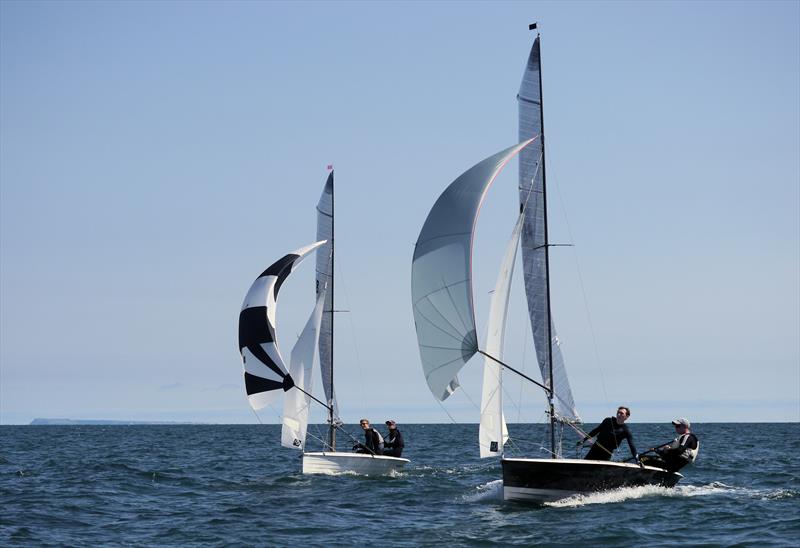 Andy Davis leading Chris Gould into the finish during Aspire Merlin Nationals at Lyme Regis day 3 photo copyright Pauline Rook taken at Lyme Regis Sailing Club and featuring the Merlin Rocket class