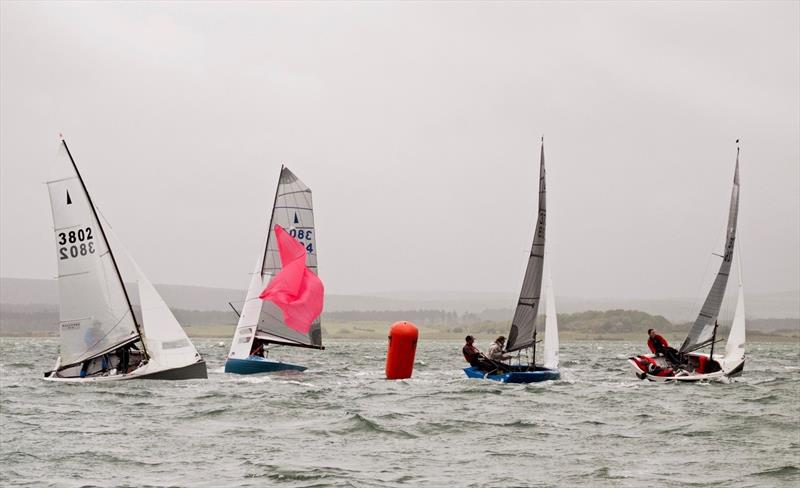 Leeward mark rounding during the Parkstone Merlin Rocket Open photo copyright Jon Barnaby taken at Parkstone Yacht Club and featuring the Merlin Rocket class