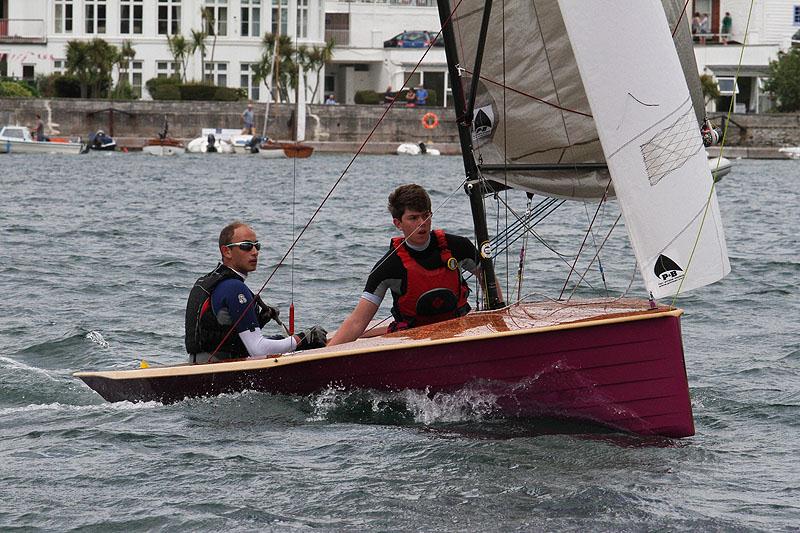 Midweek action from Salcombe Week 2012 photo copyright John Murrell / www.fotoboat.com taken at Salcombe Yacht Club and featuring the Merlin Rocket class
