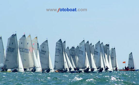 Merlin Rocket nationals at Lyme Regis photo copyright Ian Wallace / www.fotoboat.com taken at Lyme Regis Sailing Club and featuring the Merlin Rocket class