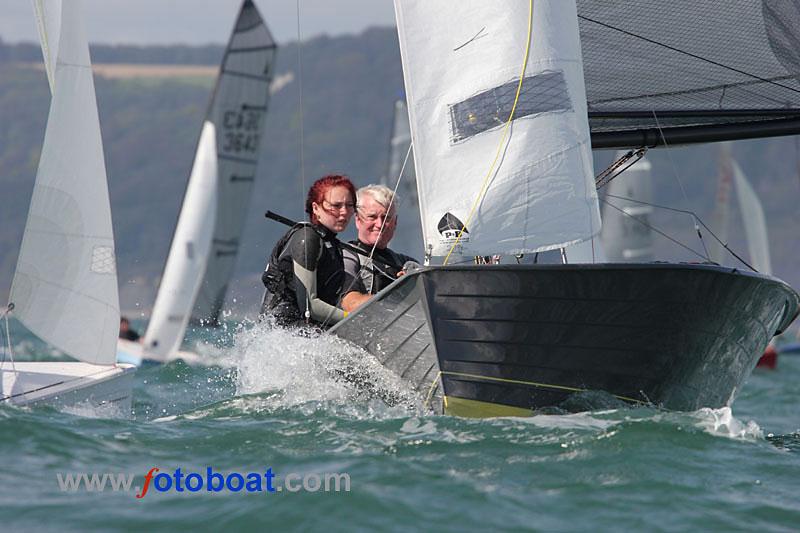 Day 3 of the Merlin Rocket nationals at Lyme Regis photo copyright Mike Rice / www.fotoboat.com taken at Lyme Regis Sailing Club and featuring the Merlin Rocket class