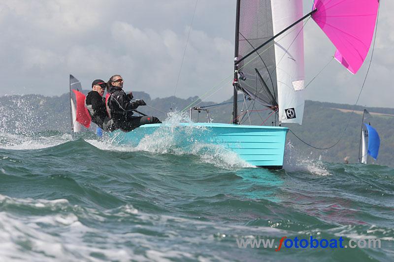 Day 3 of the Merlin Rocket nationals at Lyme Regis photo copyright Mike Rice / www.fotoboat.com taken at Lyme Regis Sailing Club and featuring the Merlin Rocket class