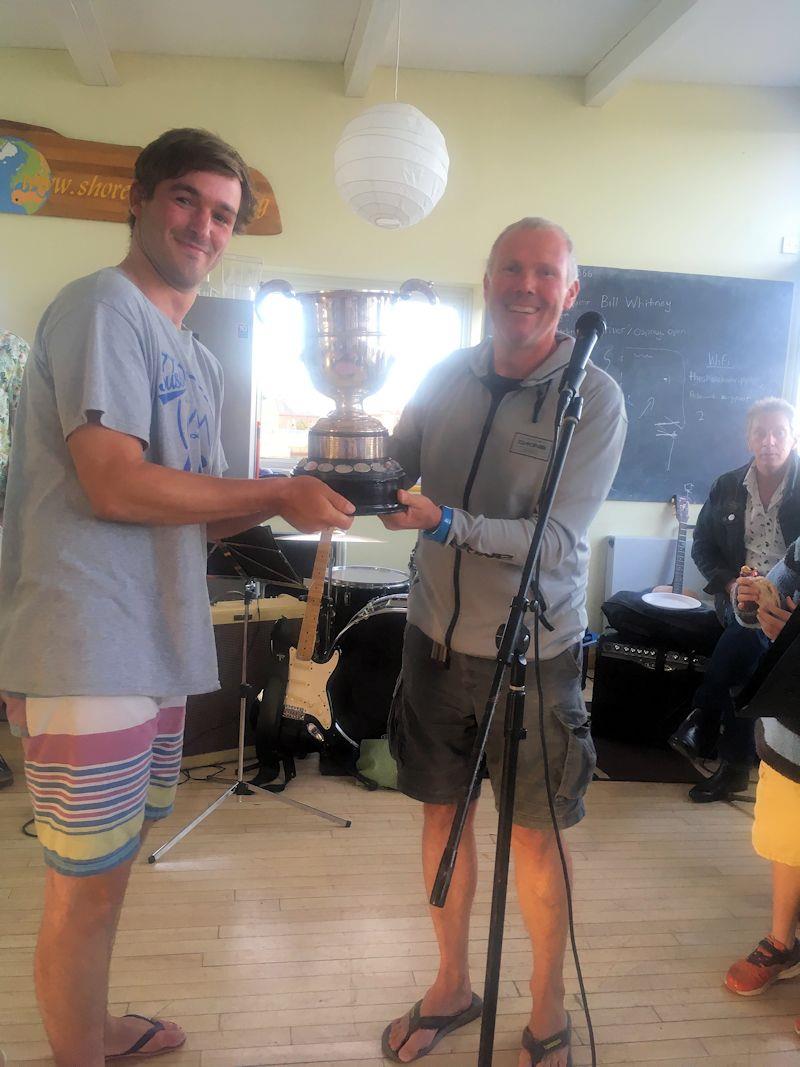 Tom Ballantyne receives the match race trophy at the cancelled Merlin Rocket Craftinsure Silver Tiller at Shoreham photo copyright Fran Gifford taken at Shoreham Sailing Club and featuring the Merlin Rocket class