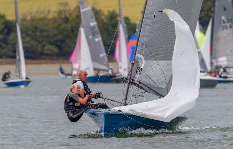 Pat and Jilly Blake taken by surprise by the descent of their jib on day 1 of Salcombe Gin Merlin Rocket Week 2019 - photo © Paul Gibbins / pgcphotography.pixieset.com