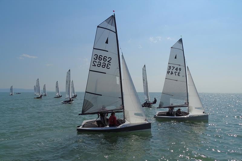 Just after the start during the Craftinsure Merlin Rocket Silver Tiller at Mumbles photo copyright Mumbles YC / Annick Wilks  taken at Mumbles Yacht Club and featuring the Merlin Rocket class