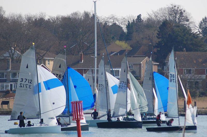 A running start during the Hamble Warming Pan photo copyright Dougal Henshall taken at Warsash Sailing Club and featuring the Merlin Rocket class