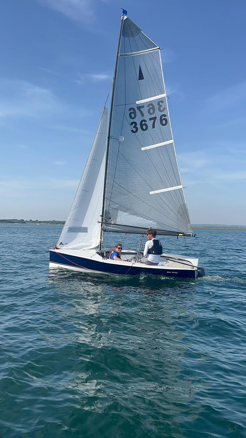 Merlin Rocket Youth Nationals 2023 at Itchenor - Hot Totty James Gifford sailing with Fran Gifford win the title photo copyright Freya Lillywhite taken at Itchenor Sailing Club and featuring the Merlin Rocket class