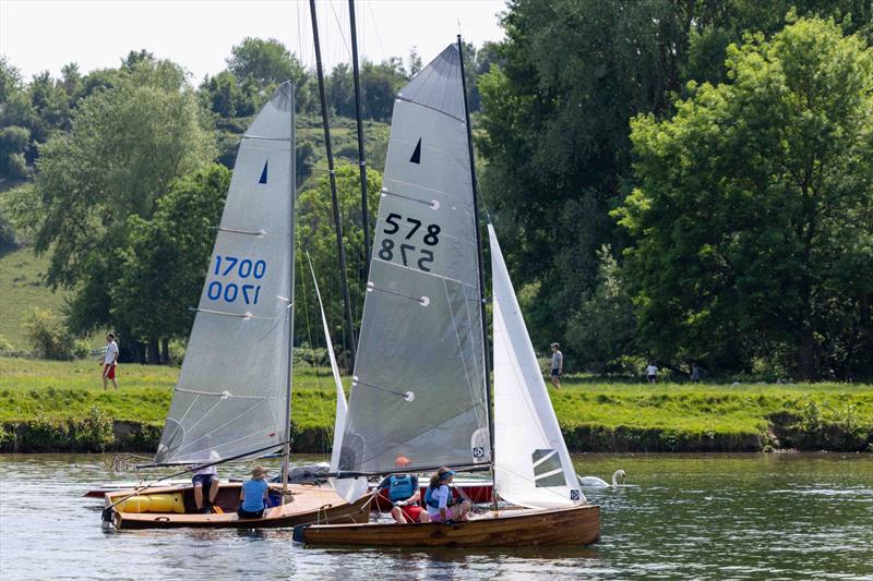 Navigating past the moored Thames A Raters at the Merlin Rocket River Championships as part of Bourne End Week - photo © Tony Ketley