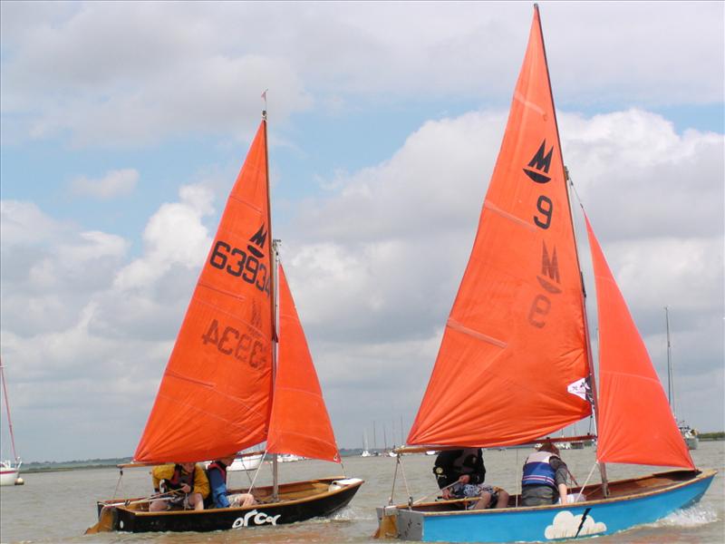Gaff-rigged craft and modern classics mix it up on the Walton Backwaters photo copyright Sue Feather taken at Walton and Frinton Yacht Club and featuring the Mirror class