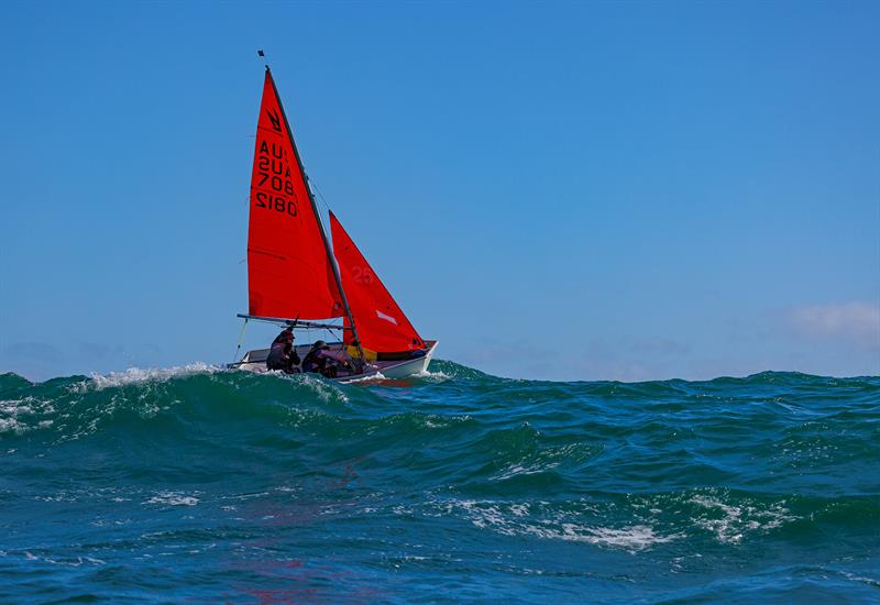 Cresting a swell. James and Harry Komweibel try and keep their speed up as they climb over a mountain during the final day of the Marriott Mirror Worlds hosted by Point Yacht Club offshore of Durban - photo © David Knox-Whitehead