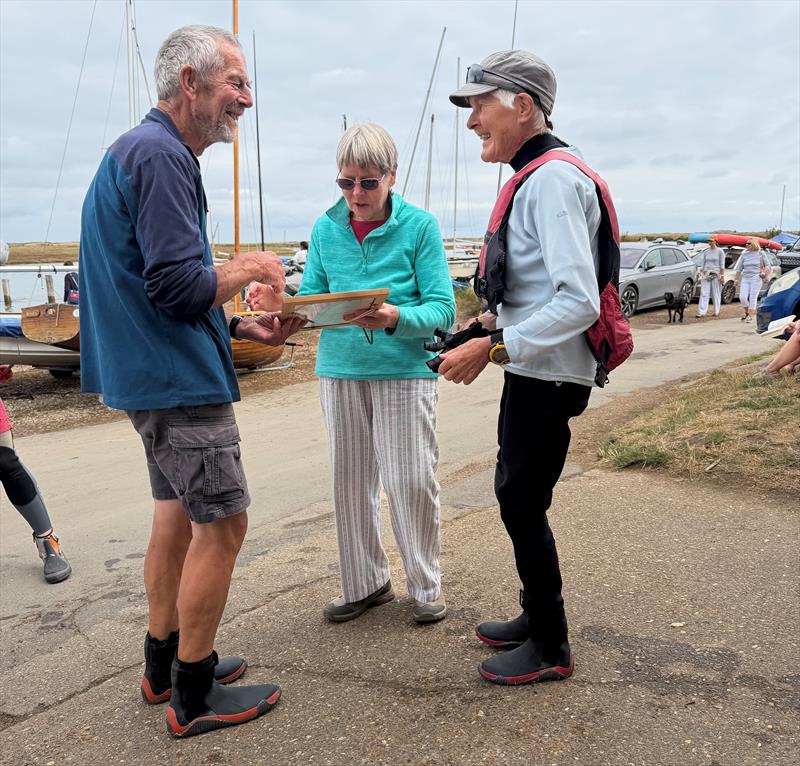 Linda Roy presenting the Timmy Roy Trophy to Dave Cooper and Jane Heath, winners of the Overy Staithe Sailing Club Mirror Open - photo © Bernard Clark and Ellie Clark
