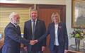 The Commodore, Brian Hinde, left, welcomes Donna Redford at the Club's AGM. Mr Stocks is moving to a new post in rugby football © Michael Ford