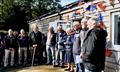 Club Presidents Basil and Rachel Thompson (5th & 6th from left) flanked by current and past Commodores at the official opening of the new clubhouse © Shropshire SC