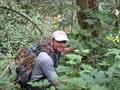 Mike Sullivan, the day after the author's wedding, on one of his many deep dives into blackberry bushes to gather fresh berries. He somehow managed to avoid all thorns, while harvesting impressive yeilds © David Schmidt