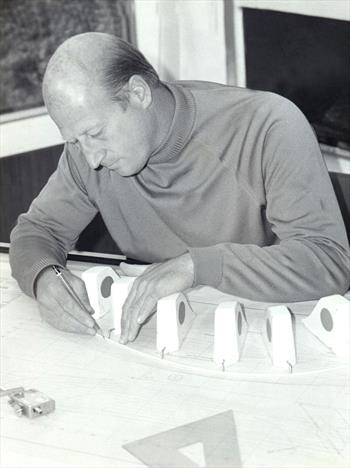 Peter Milne at work at his drawing board. A busy and successful designer of both yachts and dinghies, it is easy to think of him just in terms of the Fireball. But his designs ranged over many disciplines - photo © PPL Picture Library