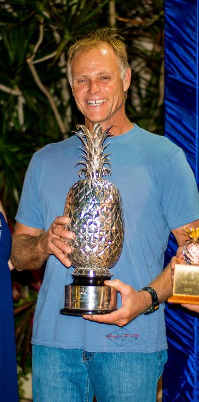 Shockwave's Reggie Cole accepts the top prize for the Pineapple Cup - Montego Bay Race in 2013 photo copyright www.sukimacphoto.com taken at 
