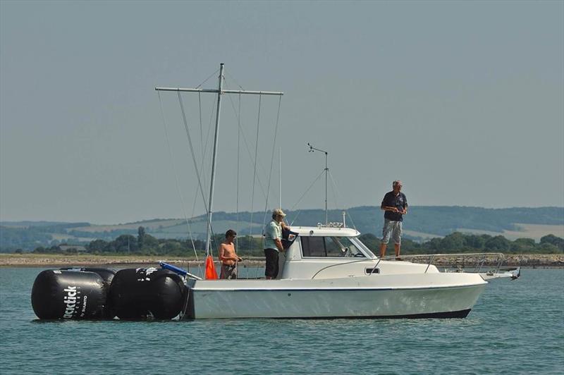 A sight that so many dinghy racers will recognise! Bev Moss on the Committee Boat at an event at Hayling Island SC - photo © Chris Bashall