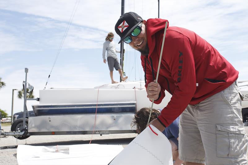 Race crew are all smiles as they prep their boats for 2016 Sperry Charleston Race Week photo copyright Charleston Race Week / Tim Wilkes taken at Charleston Yacht Club