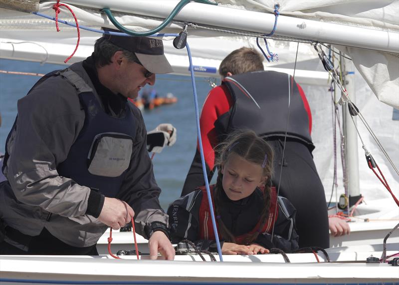 Austin Bowers, (Llandudno Sailing Club Vice Commodore) helps out with sailing advice for one of those taking advantage of Push the Boat Out photo copyright Tony Mottram taken at Llandudno Sailing Club