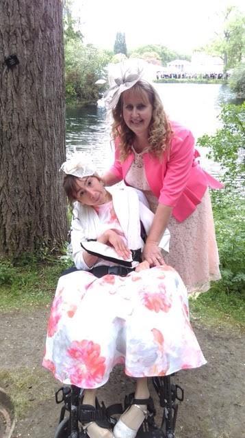 Natasha Lambert, and her mother Amanda attend a Queens' Garden party photo copyright Miss Isle taken at 