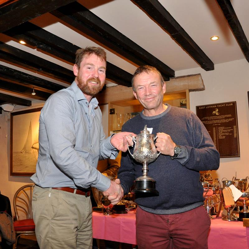 Iain McGonigal was presented with the ‘Trainer of the Year' trophy by Robbie Lawson, Commodore at the East Lothian Yacht Club Prize Giving photo copyright David Farmer taken at East Lothian Yacht Club