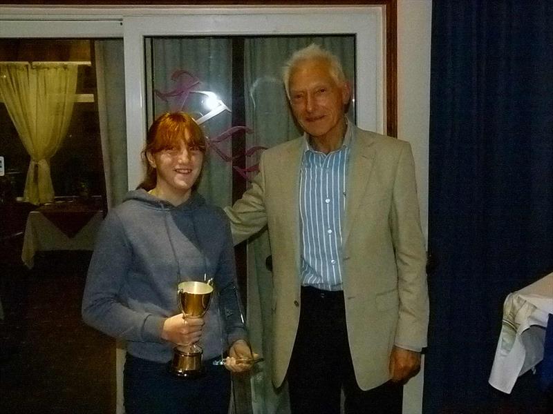 Bethan Cowd receiving the Commitment award from Club President, Tony Ayers at the Torpoint Mosquito dinghy prize giving photo copyright Keith Watts taken at Torpoint Mosquito Sailing Club
