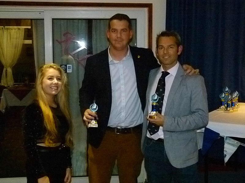 Steve Roberts & Ruby Pearce-Casey receiving awards from Iain Grey of G & R Electrical Wholesalers at the Torpoint Mosquito dinghy prize giving photo copyright Keith Watts taken at Torpoint Mosquito Sailing Club