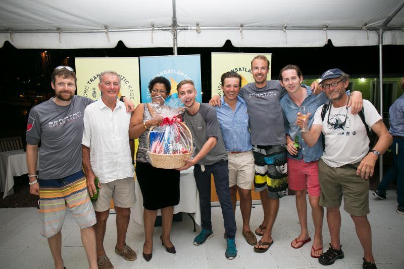 Crew of Challenger, Whitbread 60 receives a gift basket at the prizegiving - photo © RORC / Arthur Daniel