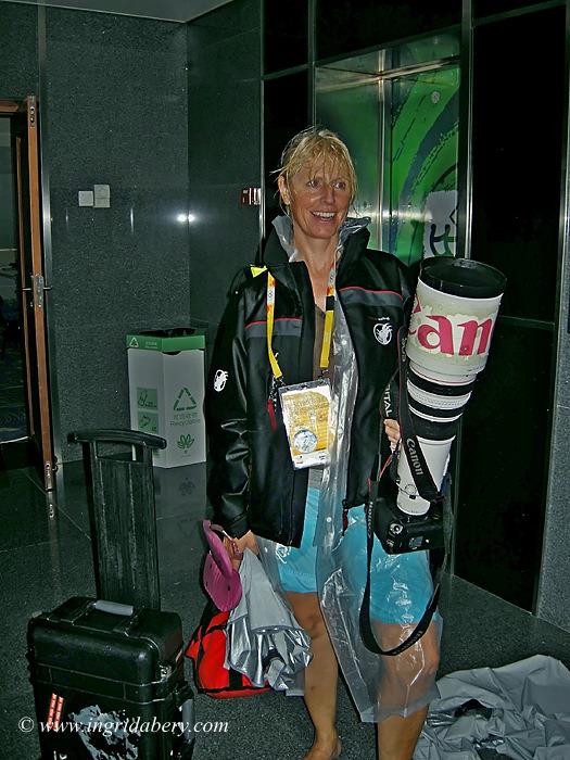 The glamourous side of sailing photography - Ingrid Abery on a very wet day in Qingdao! photo copyright Ingrid Abery / www.ingridabery.com taken at 