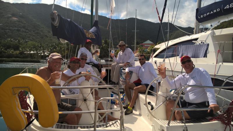 Cheers! Keith LiGreci's team on Girasoli enjoy a post-race refreshment on day 2 of the BVI Spring Regatta photo copyright BVISR / www.ingridabery.com taken at Royal BVI Yacht Club